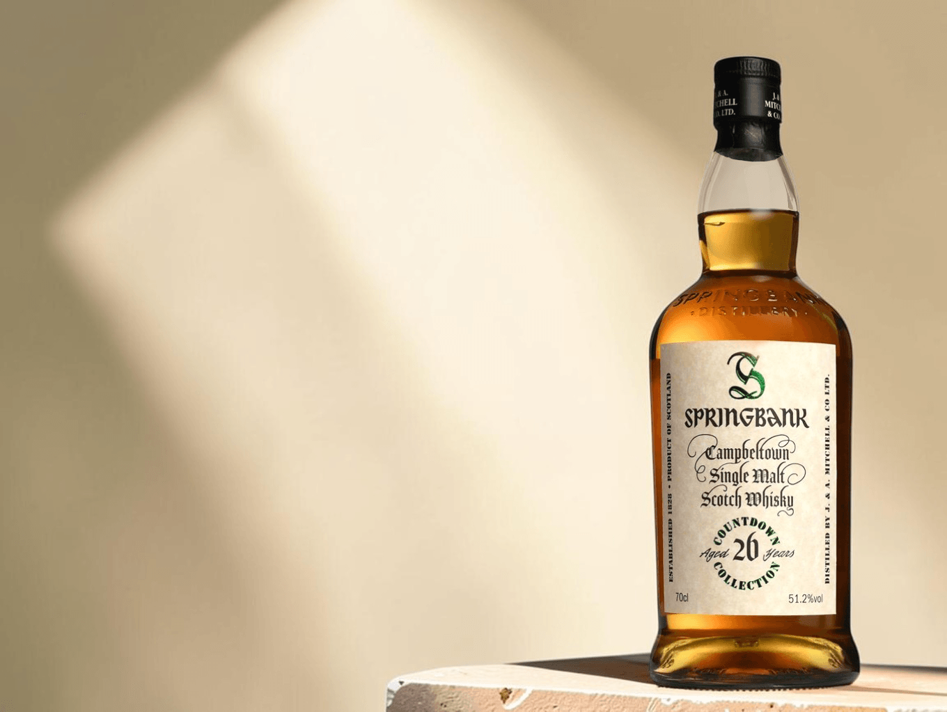 A bottle of Springbank 26 Year Old Campbeltown single malt from the Countdown Collection, lit by soft window light