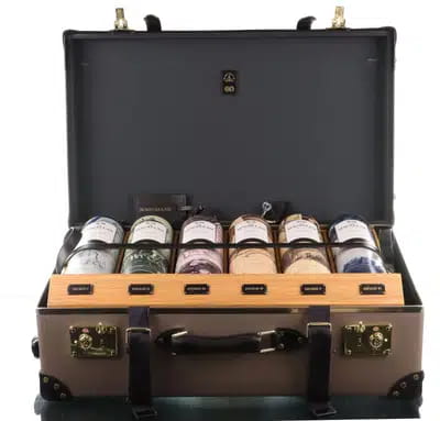 Macallan James Bond 60th Anniversary Release | Decades 1-6 & Globe-Trotter Suitcase With Prints For Auction